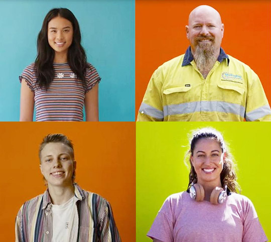 Four people from different backgrounds each standing in front of a coloured background