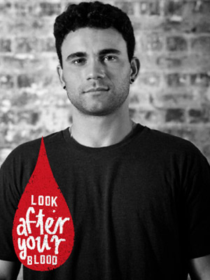 Photo of a young Aboriginal man overlayed with a red blood drop graphic which says 'Look after your blood'