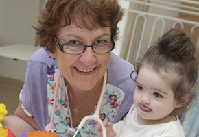 Young toddler with nurse